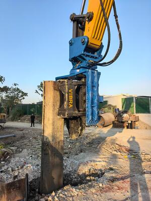 Martillo de pilotes con agarre lateral: cabezal de conducción con inclinación bidireccional y golpe energético de alto impacto con funcionamiento ecológico y silencioso